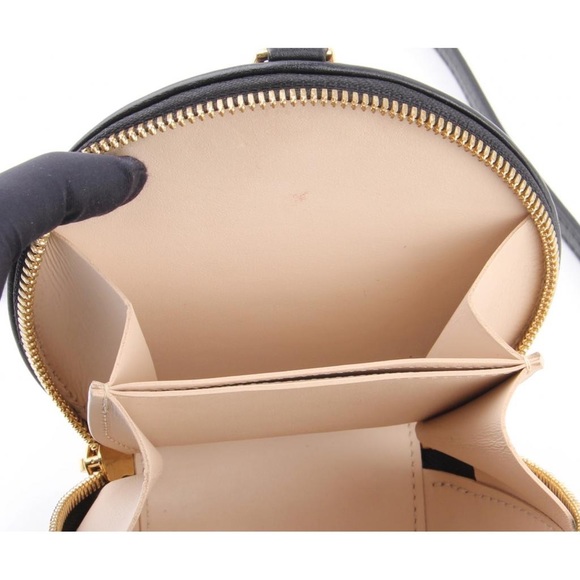 Fashioned from Monogram Reverse canvas - Picture 8 of 16